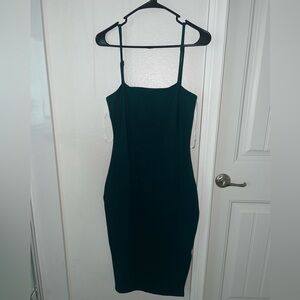 Dark green dress. Only wore once, but still has the tags.
